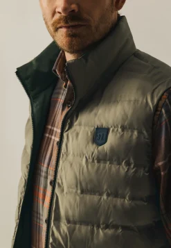 Omkeerbare bodywarmer met hoge kraag Bodywarmers